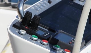 Variable speed control joystick panel in dashboard on a boat